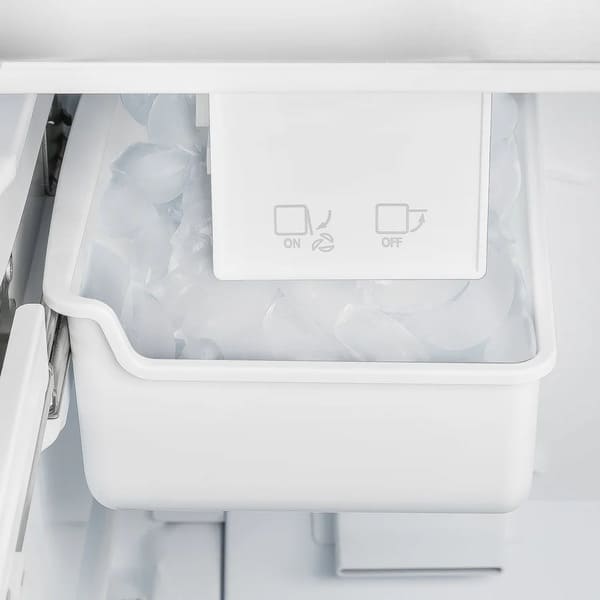 Close-up view of the built-in ice maker inside the Forno 30-inch refrigerator in white, showing the ice tray and compartment designed for convenient automatic ice production.