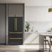 Forno 36-inch French door refrigerator in a lifestyle kitchen setting, shown in black with antique brass handles, complementing modern cabinetry and décor.
