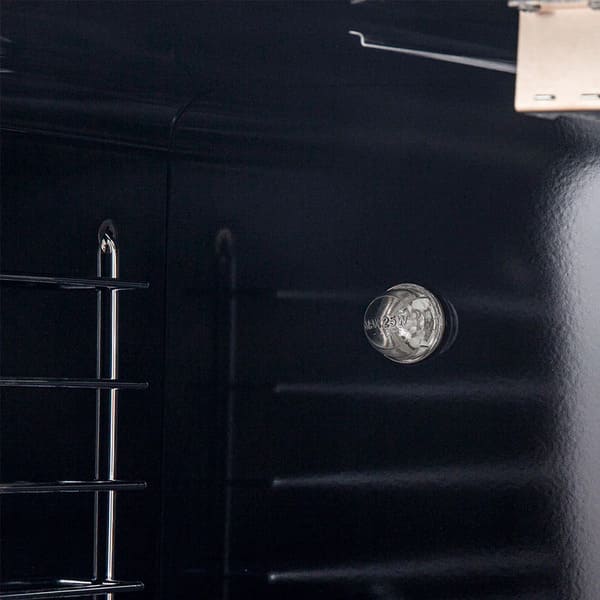 Close-up of the interior oven lights in the FORNO 36-inch gas range in stainless steel, illuminating the oven cavity for clear visibility while cooking.
