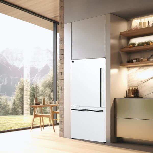 Lifestyle view of the FORNO 31-inch left-hinge refrigerator in white, integrated seamlessly into a bright, modern kitchen environment.