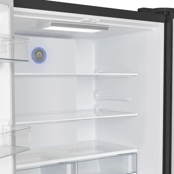 Interior view of the FORNO 36-Inch French Door Refrigerator in Black, highlighting the crisper drawers and glass shelves designed for fresh food storage and flexible organization.