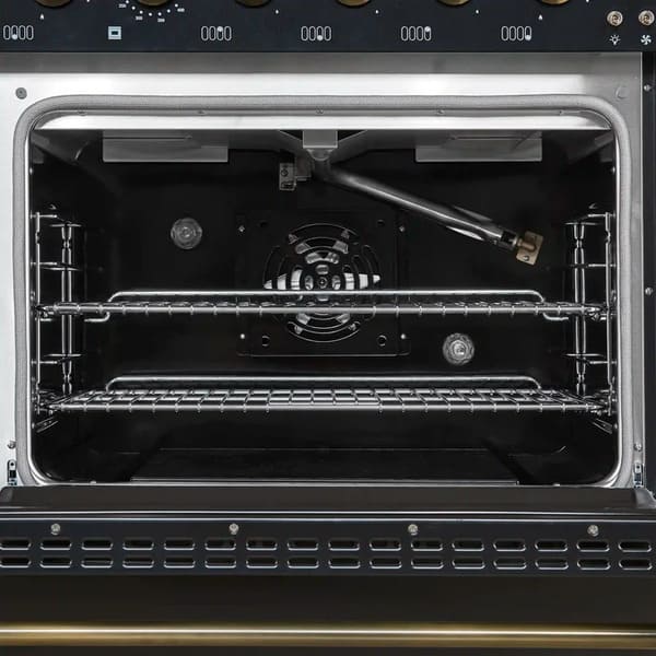 Interior view of the main oven in the FORNO Antico 48-Inch Dual Fuel Range in black, featuring a spacious blue enamel cavity, convection fan, and durable multi-rack configuration.