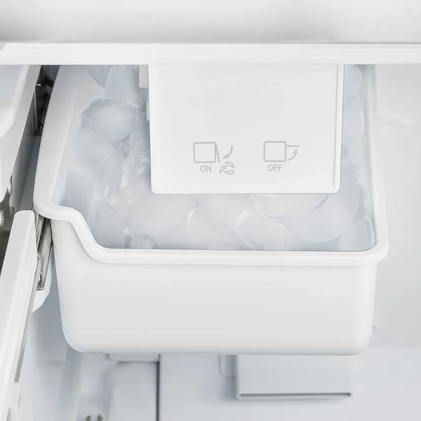 Close-up of the ice maker inside the FORNO 36-inch French door refrigerator in stainless steel, showcasing its built-in automatic ice-making feature.