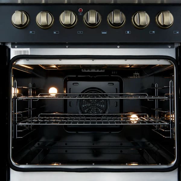 Interior view of the FORNO Galiano 30-Inch French Door Dual Fuel Range in black, showcasing the blue porcelain oven cavity, convection fan, and multiple rack positions for flexible baking and roasting.