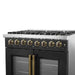 Right-angle view of the FORNO Galiano 36-Inch Dual Fuel Range in black, highlighting the illuminated metal control knobs and sleek front panel design.
