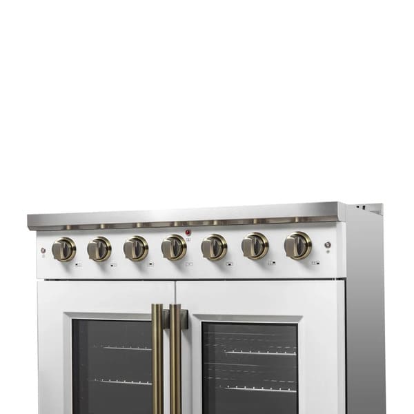 Right-angled close-up of the control knobs on the FORNO Galiano 36-Inch French Door Gas Range in white, featuring antique brass accents, illuminated bezels, and precise burner control layout.