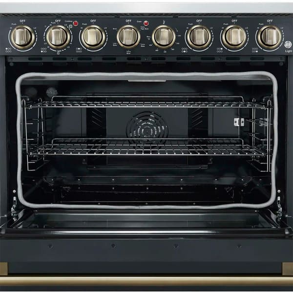 Close-up view of the oven interior on the FORNO Paolo 36-Inch Electric Range in black, featuring a blue enamel cavity, convection fan, and heavy-duty racks for multi-level cooking.