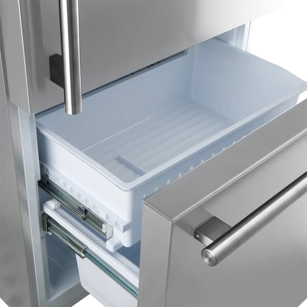 Open view of the freezer drawer on the FORNO Milano stainless steel French door refrigerator, revealing spacious, dual-level storage compartments with smooth-glide rails, ideal for organizing frozen foods within the 4-Piece Appliance Package.