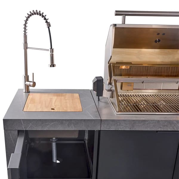 Open view of the sink compartment on the FORNO Rimini 30-Inch Outdoor Kitchen, showcasing a stainless steel basin with a high-arc faucet, integrated into the countertop for convenient outdoor food prep and cleanup.