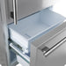 Open lower freezer drawer of FORNO Milano Stainless Steel Refrigerator, showing spacious compartment with organized storage layout.