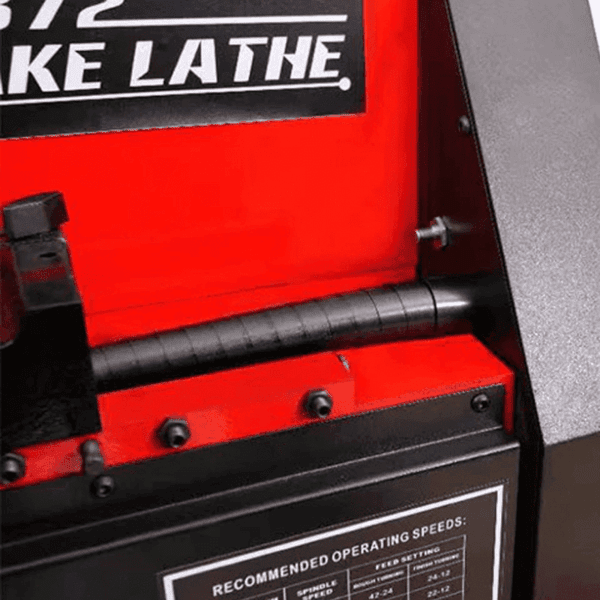 Detailed view of the Katool C9372 brake lathe showing control panel, speed chart, and sturdy red and black housing.