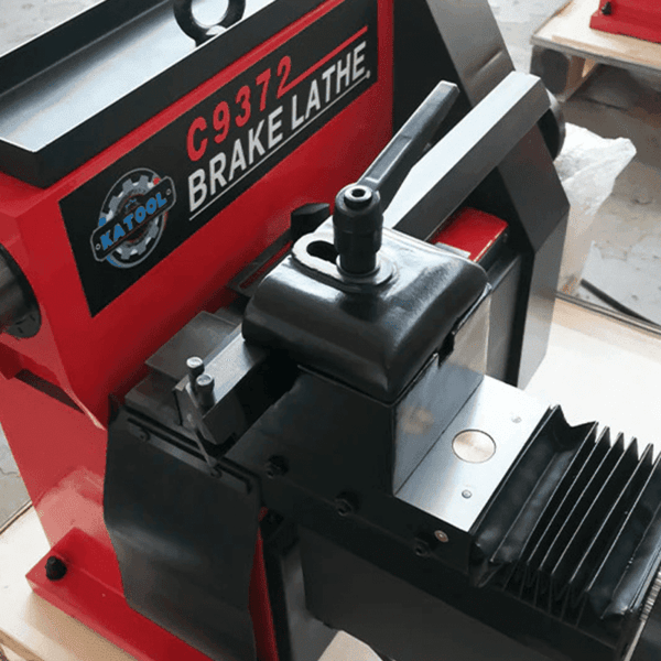 Close-up of Katool C9372 brake lathe fine adjustment knob for accurate cutting operations.