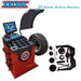 Katool KT-B750 wheel balancer with mounted wheel, protective hood, and included accessories, backed by 15 months warranty.