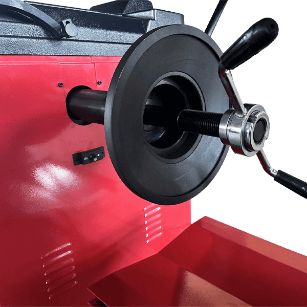 Heavy-duty wheel mounting shaft of Katool KT-B795L wheel balancer designed for accurate wheel installation and balancing.