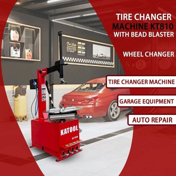 Katool KT-T810 tire changer machine with bead blaster in auto repair shop, ideal for garages.