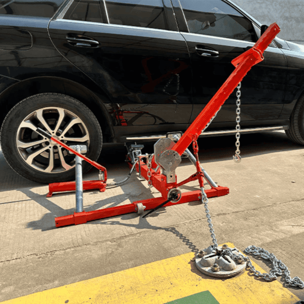 Katool KT-YA260 Auto Body Frame Straightener pulling SUV frame with hydraulic system and anchor chain.