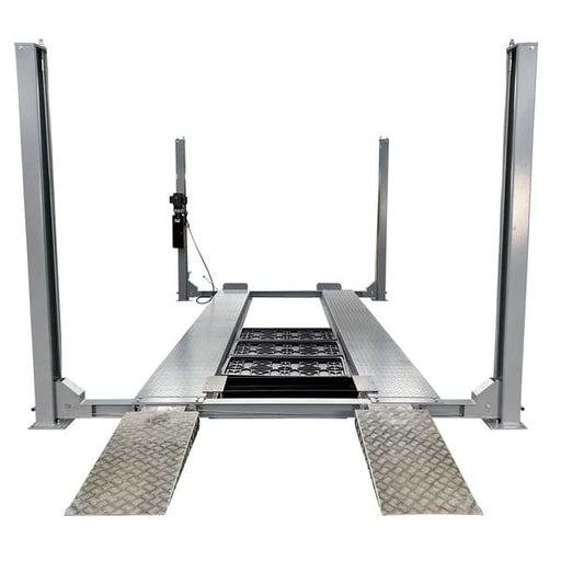 Front view of Triumph NSS-11 Four Post Automotive Lift showing heavy-duty steel frame and wide drive-thru access