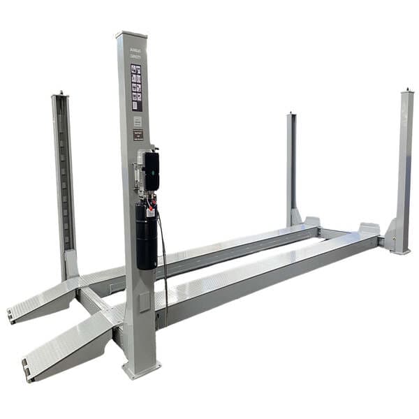 Full view of Triumph NTR-24 four post auto lift featuring 24,000 lbs capacity and steel ramps.