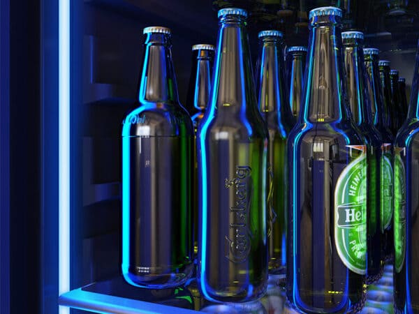 Interior of the ZEPHYR Full Size Single Zone Beverage Cooler lit with deep blue LED lighting, creating a sleek and modern display for beverages