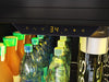 Close-up of the ZEPHYR Full Size Single Zone Beverage Cooler control panel glowing with amber LED lighting, featuring digital display and touch controls