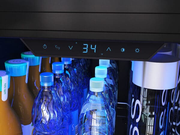 Close-up of the ZEPHYR Full Size Single Zone Beverage Cooler control panel illuminated with deep blue LED lighting, highlighting touch controls and settings