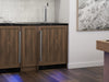 ZEPHYR Kegerator & Beverage Cooler with custom panel kit installed, blending seamlessly with surrounding cabinetry for a built-in, integrated look