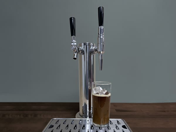 ZEPHYR Outdoor Kegerator & Beverage Cooler shown head-on with double tap kit and Nitrogen Conversion Kit installed, showcasing dual-tap configuration and sleek outdoor-ready design