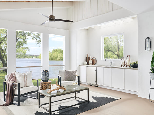 ZEPHYR Outdoor Single Zone Beverage Cooler in a complete outdoor kitchen environment, emphasizing sleek stainless steel and built-in installation.