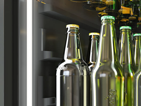 Interior of the ZEPHYR Panel Ready Full Size Beverage Cooler illuminated with cloud white LED lighting, showcasing organized beverage storage