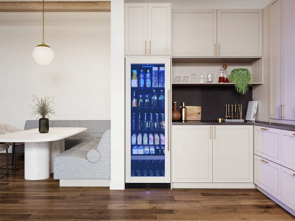 Head-on view of the ZEPHYR Panel Ready Full Size Beverage Cooler built into a contemporary kitchen setting, perfectly aligned with surrounding cabinetry