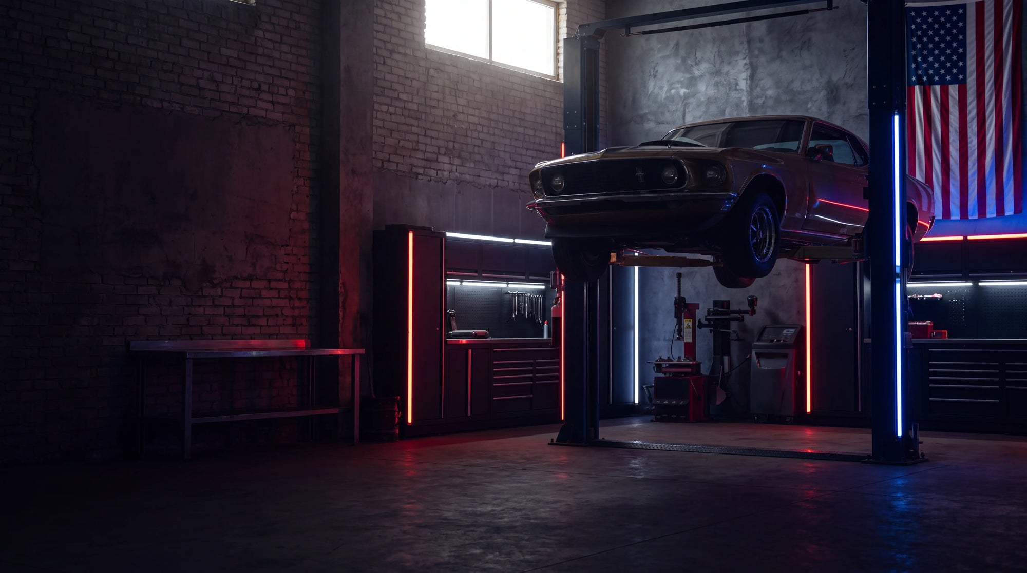 July 4th hero — classic car on two-post lift, American flag garage