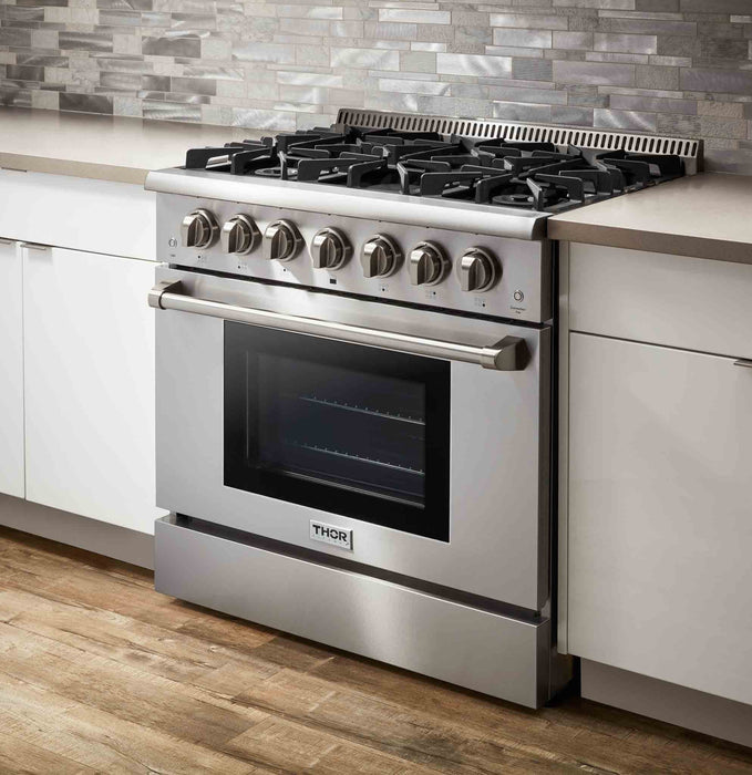 Thor Kitchen 4-Piece Pro Appliance Package - 36-Inch Gas Range, French Door Refrigerator, Pro-Style Wall Mount Hood and Dishwasher in Stainless Steel